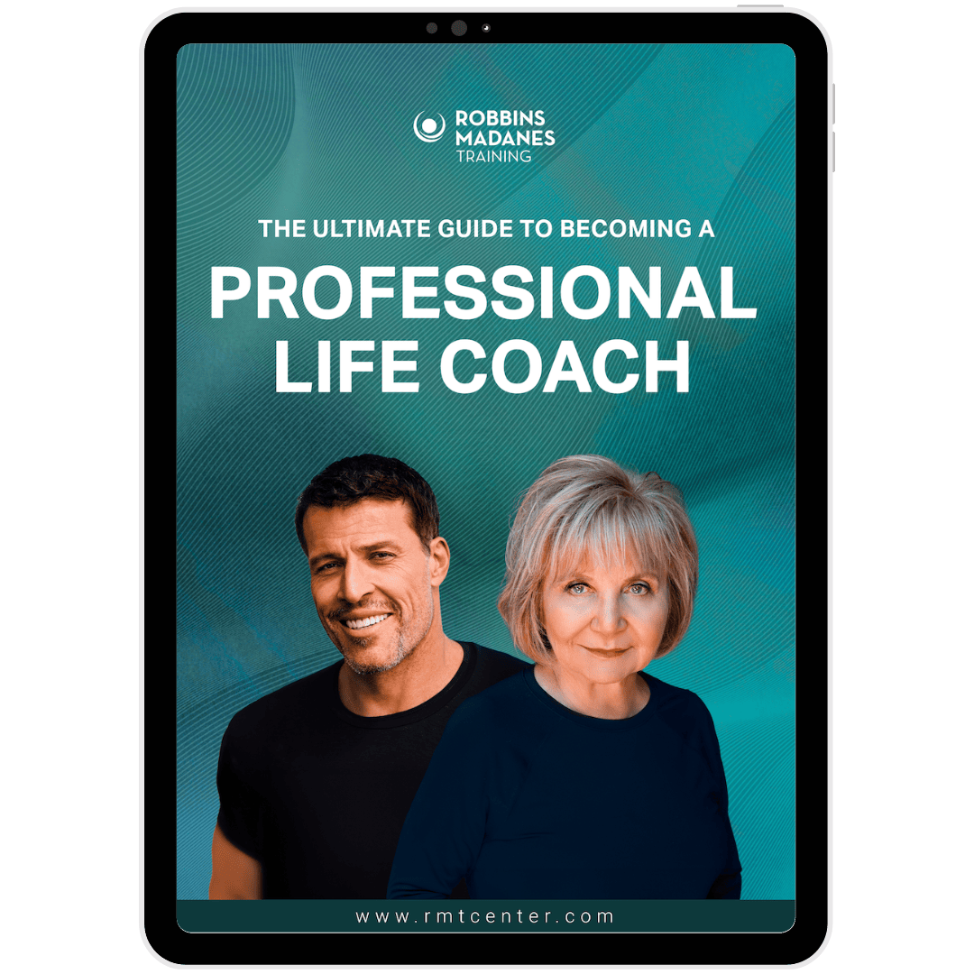 A tablet displaying a cover for "The Ultimate Guide to Becoming a Professional Life Coach" from Robbins Madanes Training, featuring a man and a woman, showcasing Tony's strategic coaching techniques.